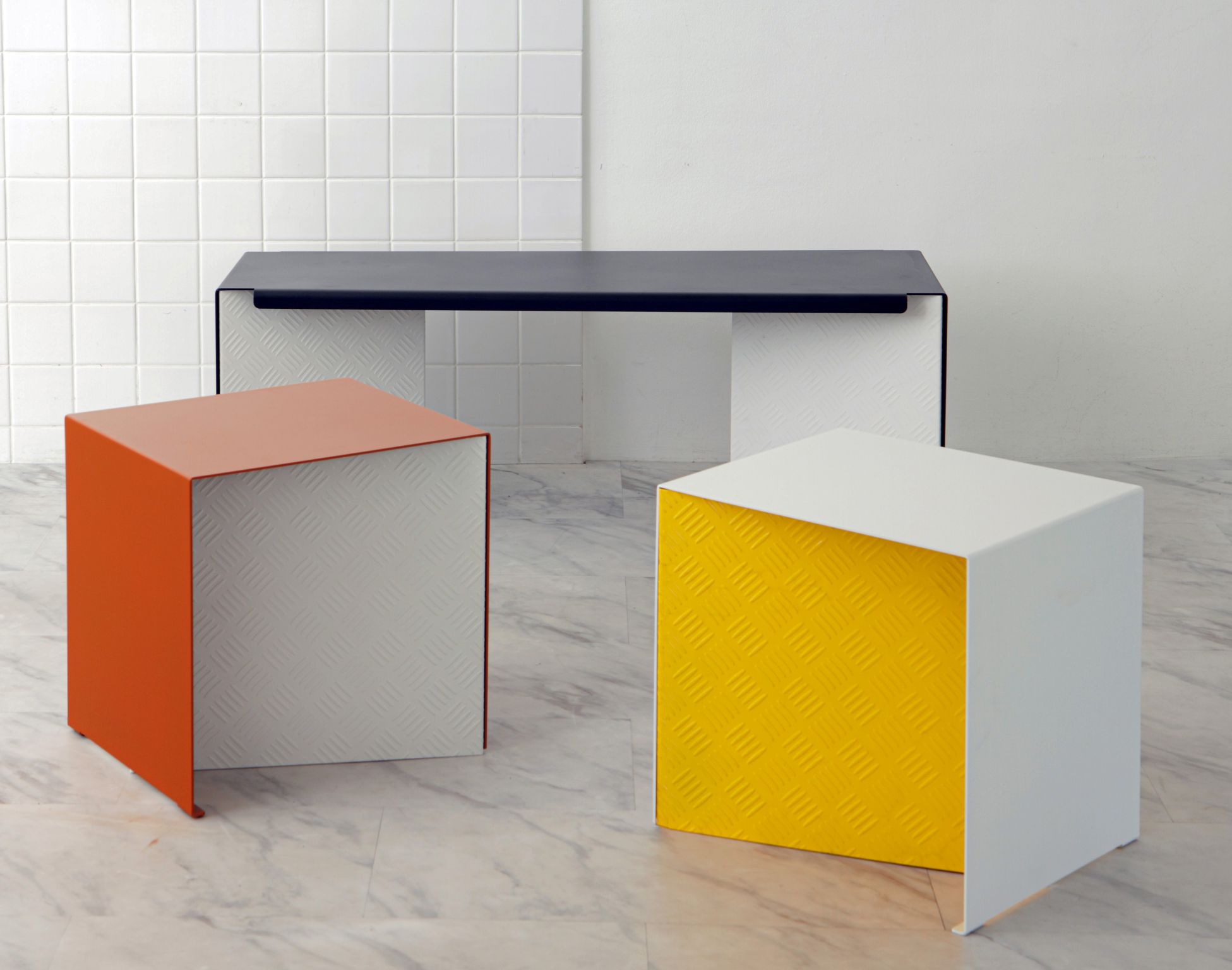 Metro bench and stools in black, orange, white, and yellow finishes